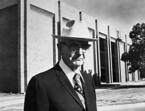 Dr. Richardson in front of The Richardson Library